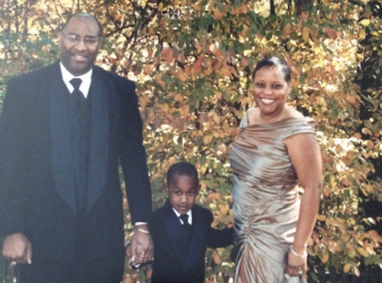 Image of a family dressed for the holidays,